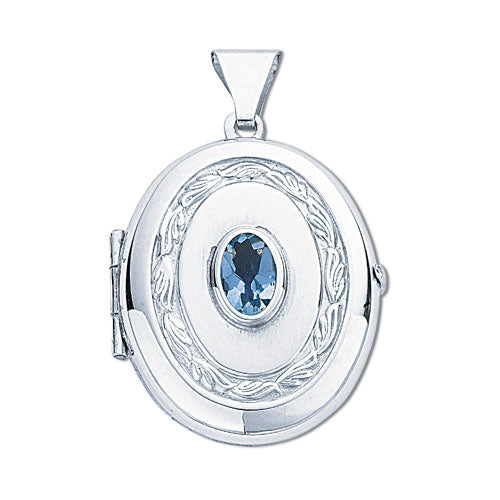 Silver Oval Shaped Blue Topaz Set Locket