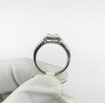 18ct White Gold Illusion Emerald Cut Halo Diamond Engagement Ring